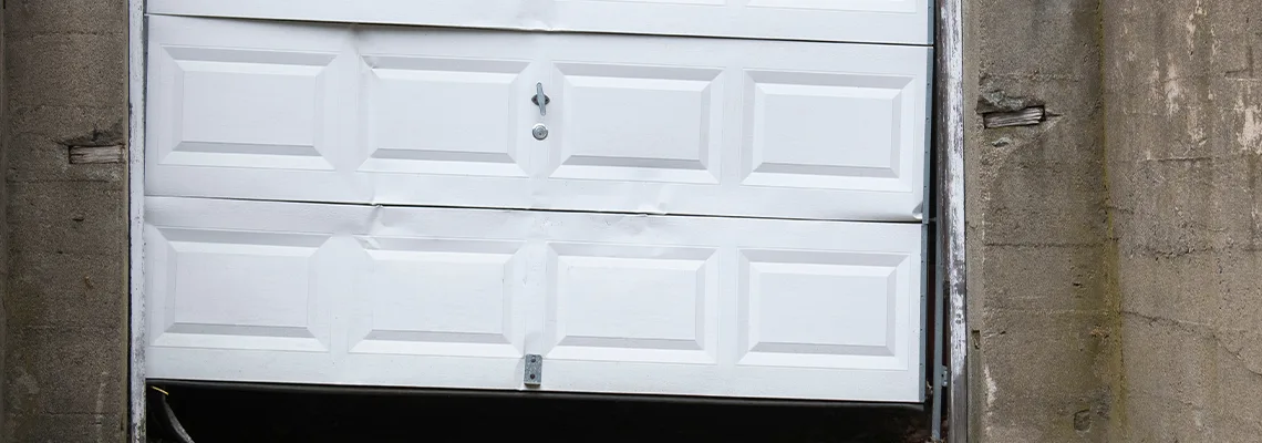 Garage Door Got Hit By A Car Dent Removal in Northbrook, IL